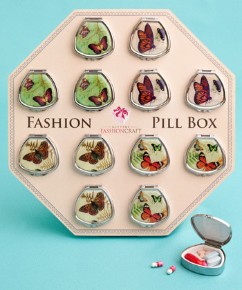 Fan-shaped pill boxes in pretty butterfly designs