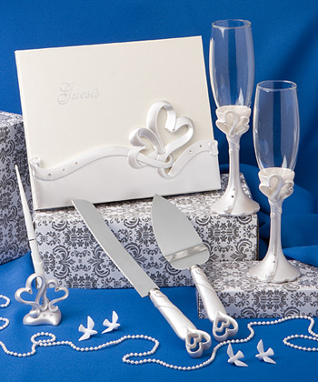Interlocking heart themed wedding day accessory set