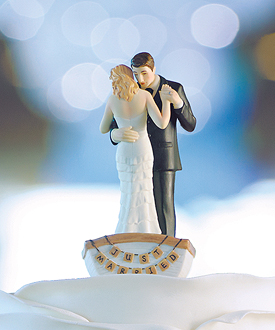 row away wedding couple in rowboat figurine